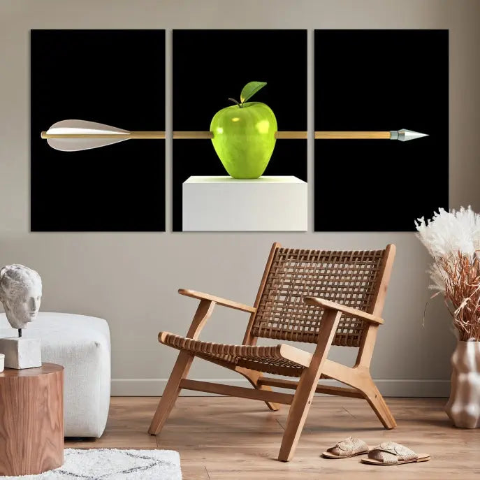 The "Apple and Arrow Wall Art Apple Illustr Canvas Print" is a triptych art piece depicting an arrow through a green apple on a black background. This gallery-wrapped artwork, printed on museum-quality canvas, ensures vibrancy and durability.