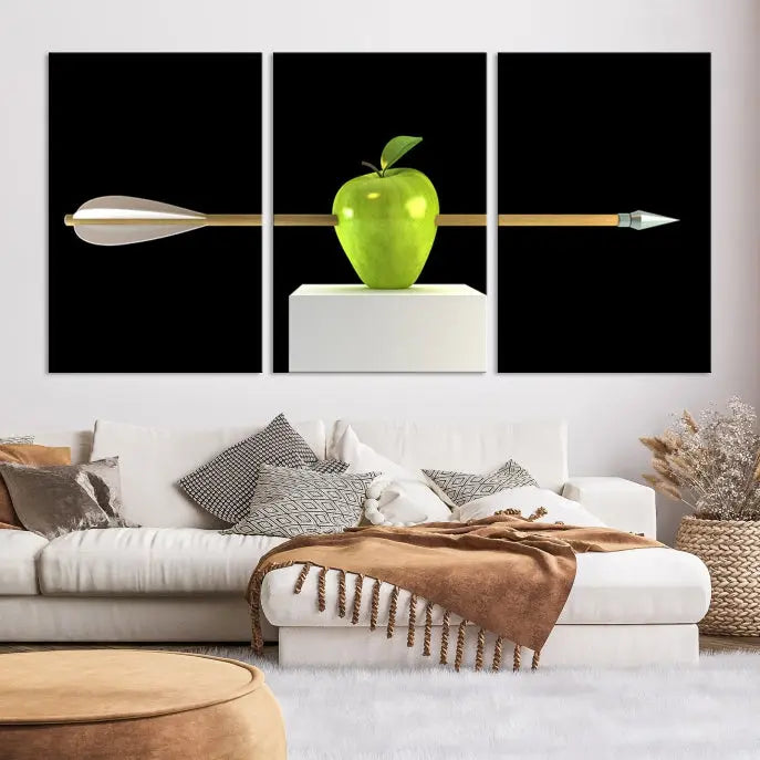 The "Apple and Arrow Wall Art Apple Illustr Canvas Print" is a triptych art piece depicting an arrow through a green apple on a black background. This gallery-wrapped artwork, printed on museum-quality canvas, ensures vibrancy and durability.