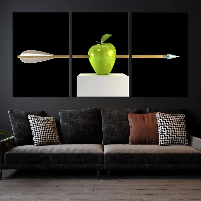 The "Apple and Arrow Wall Art Apple Illustr Canvas Print" is a triptych art piece depicting an arrow through a green apple on a black background. This gallery-wrapped artwork, printed on museum-quality canvas, ensures vibrancy and durability.