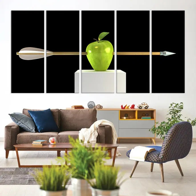 The "Apple and Arrow Wall Art Apple Illustr Canvas Print" is a triptych art piece depicting an arrow through a green apple on a black background. This gallery-wrapped artwork, printed on museum-quality canvas, ensures vibrancy and durability.