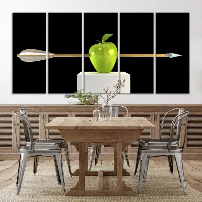 The "Apple and Arrow Wall Art Apple Illustr Canvas Print" is a triptych art piece depicting an arrow through a green apple on a black background. This gallery-wrapped artwork, printed on museum-quality canvas, ensures vibrancy and durability.