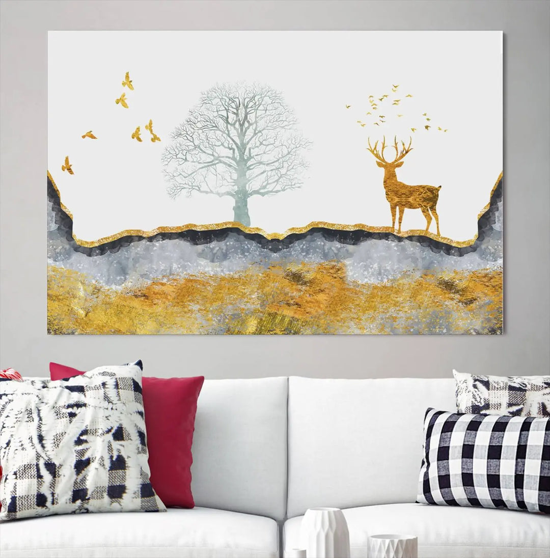 The dark gray wall is adorned with a triptych featuring a tree, birds, and a stag. This piece, titled "Artistic Deer Painting Wall Art Canvas Print Animal Wall Art Deer Art Print," is crafted as gallery-wrapped art from museum-quality polycotton and features a UV-protective coating to preserve its vibrant display.