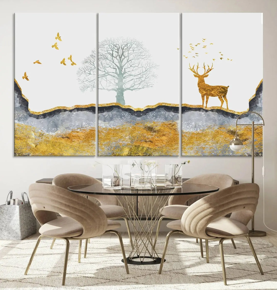 The dark gray wall is adorned with a triptych featuring a tree, birds, and a stag. This piece, titled "Artistic Deer Painting Wall Art Canvas Print Animal Wall Art Deer Art Print," is crafted as gallery-wrapped art from museum-quality polycotton and features a UV-protective coating to preserve its vibrant display.