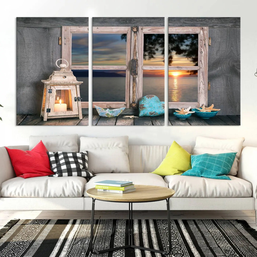 Enhance your living space with the Astonishing Sunset from the Window Wall Art Canvas Print. This triptych, crafted on museum-quality canvas with a UV-protective coating, showcases a breathtaking seaside sunset view through rustic wooden windows. It's ready to hang and will effortlessly elevate your room.