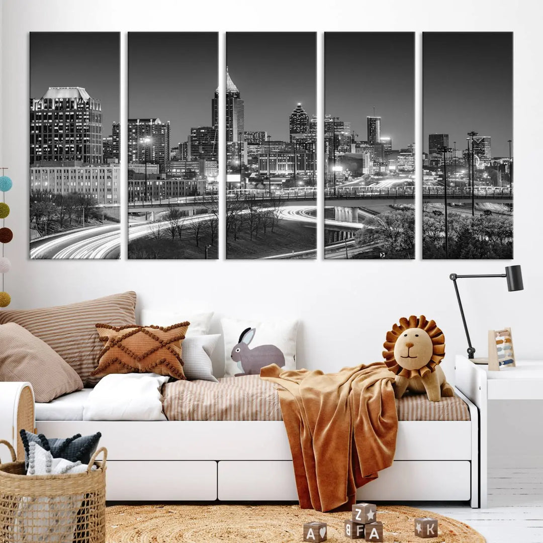 The living room is highlighted by an Atlanta Black and White Wall Art Cityscape Canvas Print that complements the black-and-white cityscape triptych on the wall, bringing an urban decor vibe to the space.