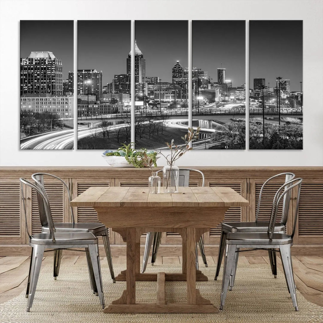 The living room is highlighted by an Atlanta Black and White Wall Art Cityscape Canvas Print that complements the black-and-white cityscape triptych on the wall, bringing an urban decor vibe to the space.