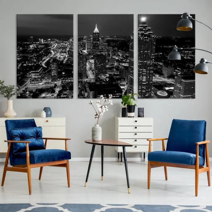 The contemporary living room features the "Atlanta Building Skyline Black and White Wall Art Cityscape Canvas Print" on the wall, designed as a gallery-wrapped museum-quality canvas for lasting elegance.