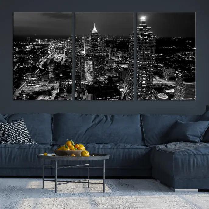 The contemporary living room features the "Atlanta Building Skyline Black and White Wall Art Cityscape Canvas Print" on the wall, designed as a gallery-wrapped museum-quality canvas for lasting elegance.