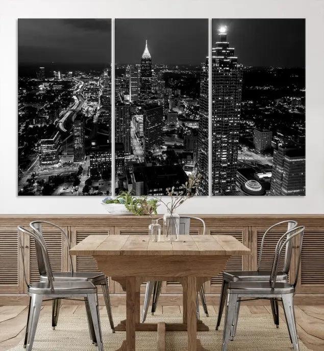 The contemporary living room features the "Atlanta Building Skyline Black and White Wall Art Cityscape Canvas Print" on the wall, designed as a gallery-wrapped museum-quality canvas for lasting elegance.