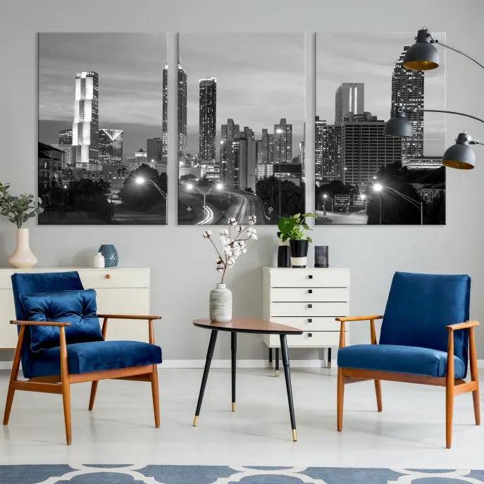 The contemporary living room showcases the Atlanta City Black and White Wall Art triptych on the wall.