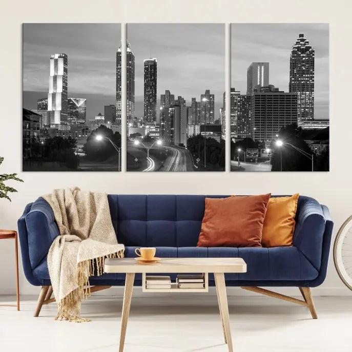 The contemporary living room showcases the Atlanta City Black and White Wall Art triptych on the wall.