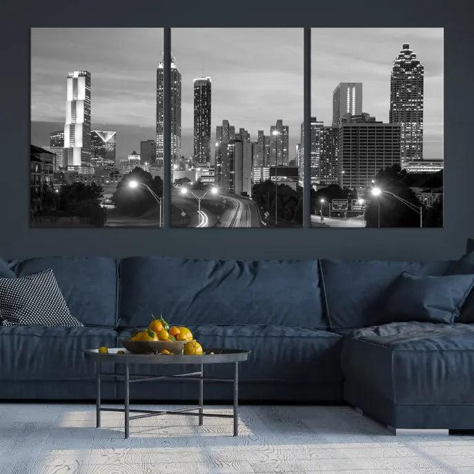 The contemporary living room showcases the Atlanta City Black and White Wall Art triptych on the wall.