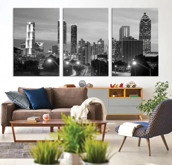 The contemporary living room showcases the Atlanta City Black and White Wall Art triptych on the wall.