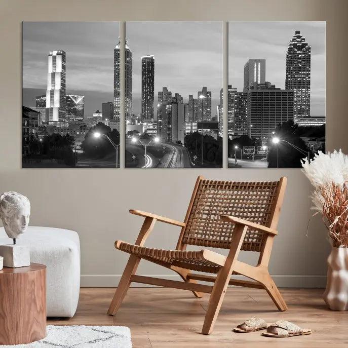 The contemporary living room showcases the Atlanta City Black and White Wall Art triptych on the wall.