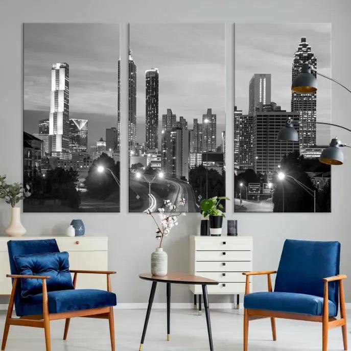 The contemporary living room showcases the Atlanta City Black and White Wall Art triptych on the wall.