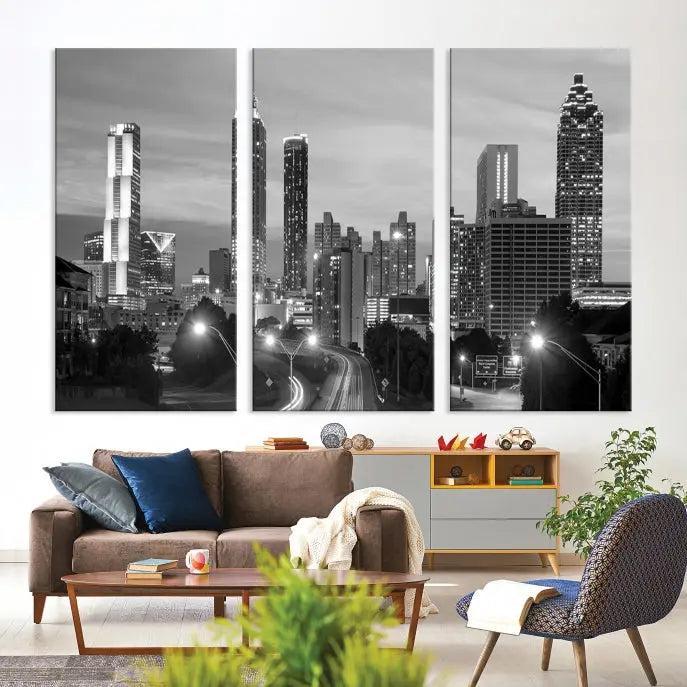 The contemporary living room showcases the Atlanta City Black and White Wall Art triptych on the wall.