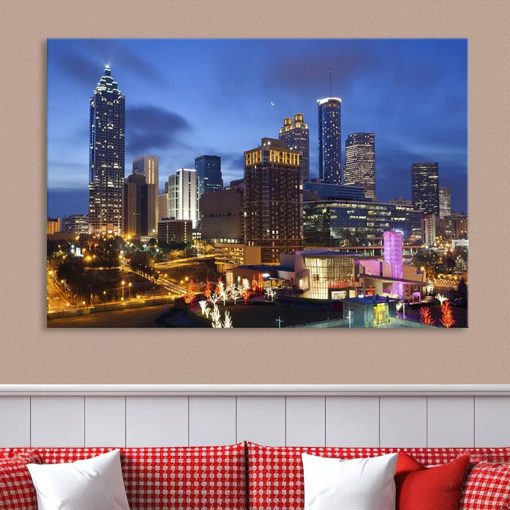 The Atlanta City Canvas Print adorns the wall, showcasing the cityscape of illuminated skyscrapers at dusk on a gallery-wrapped museum-quality canvas.