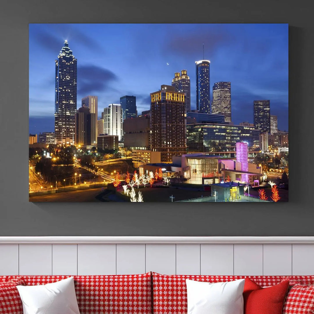 The Atlanta City Canvas Print adorns the wall, showcasing the cityscape of illuminated skyscrapers at dusk on a gallery-wrapped museum-quality canvas.