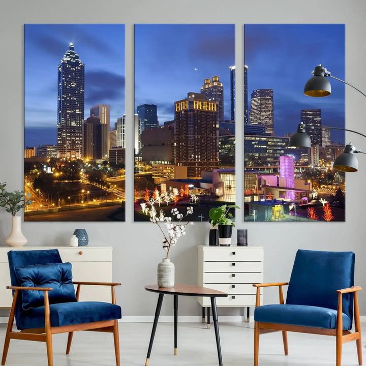 The Atlanta City Canvas Print adorns the wall, showcasing the cityscape of illuminated skyscrapers at dusk on a gallery-wrapped museum-quality canvas.