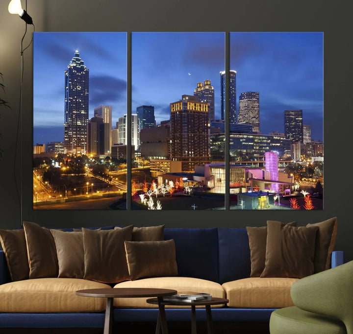 The Atlanta City Canvas Print adorns the wall, showcasing the cityscape of illuminated skyscrapers at dusk on a gallery-wrapped museum-quality canvas.