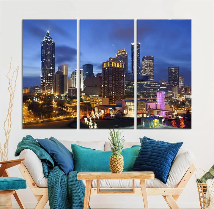 The Atlanta City Canvas Print adorns the wall, showcasing the cityscape of illuminated skyscrapers at dusk on a gallery-wrapped museum-quality canvas.