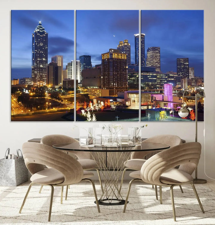 The Atlanta City Canvas Print adorns the wall, showcasing the cityscape of illuminated skyscrapers at dusk on a gallery-wrapped museum-quality canvas.