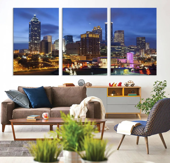 The Atlanta City Canvas Print adorns the wall, showcasing the cityscape of illuminated skyscrapers at dusk on a gallery-wrapped museum-quality canvas.