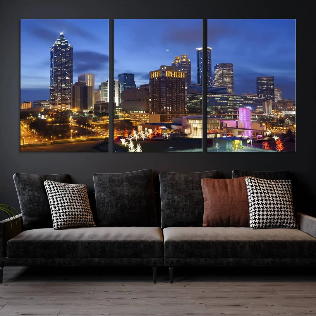 The Atlanta City Canvas Print adorns the wall, showcasing the cityscape of illuminated skyscrapers at dusk on a gallery-wrapped museum-quality canvas.