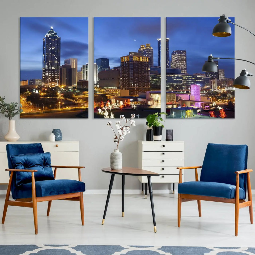 The Atlanta City Canvas Print adorns the wall, showcasing the cityscape of illuminated skyscrapers at dusk on a gallery-wrapped museum-quality canvas.