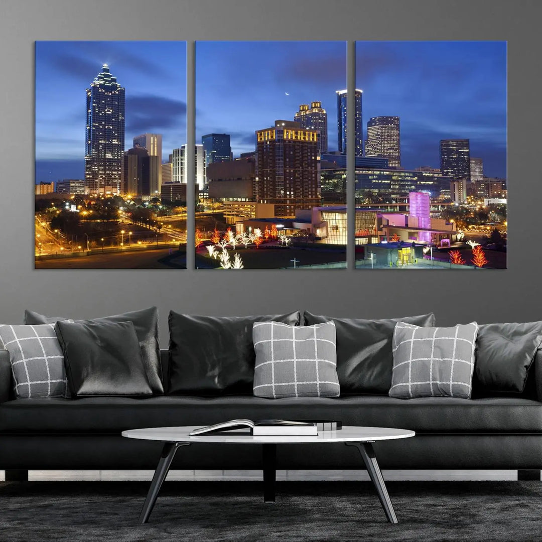 The Atlanta City Canvas Print adorns the wall, showcasing the cityscape of illuminated skyscrapers at dusk on a gallery-wrapped museum-quality canvas.