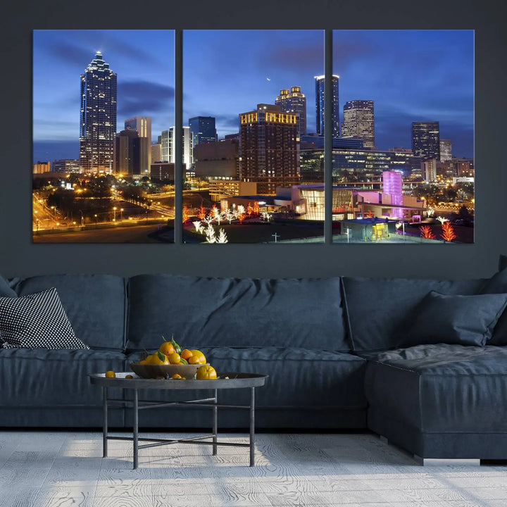 The Atlanta City Canvas Print adorns the wall, showcasing the cityscape of illuminated skyscrapers at dusk on a gallery-wrapped museum-quality canvas.