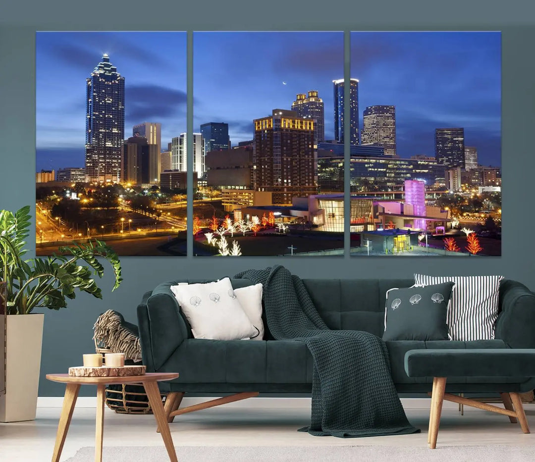 The Atlanta City Canvas Print adorns the wall, showcasing the cityscape of illuminated skyscrapers at dusk on a gallery-wrapped museum-quality canvas.