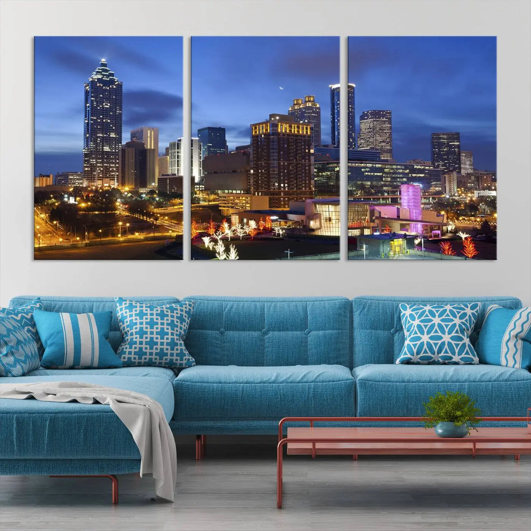 The Atlanta City Canvas Print adorns the wall, showcasing the cityscape of illuminated skyscrapers at dusk on a gallery-wrapped museum-quality canvas.