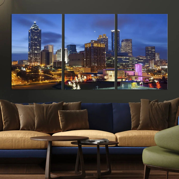 The Atlanta City Canvas Print adorns the wall, showcasing the cityscape of illuminated skyscrapers at dusk on a gallery-wrapped museum-quality canvas.