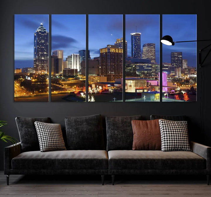 The Atlanta City Canvas Print adorns the wall, showcasing the cityscape of illuminated skyscrapers at dusk on a gallery-wrapped museum-quality canvas.