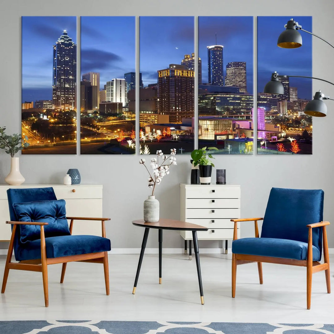 The Atlanta City Canvas Print adorns the wall, showcasing the cityscape of illuminated skyscrapers at dusk on a gallery-wrapped museum-quality canvas.