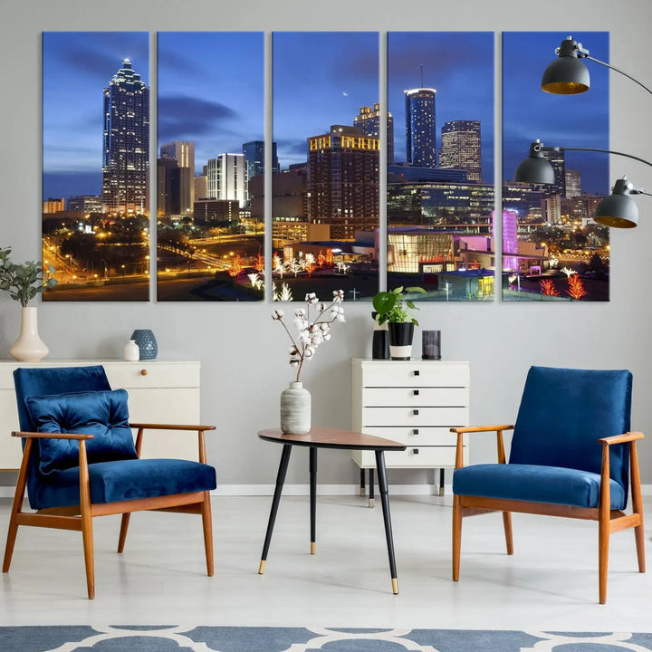 The Atlanta City Canvas Print adorns the wall, showcasing the cityscape of illuminated skyscrapers at dusk on a gallery-wrapped museum-quality canvas.