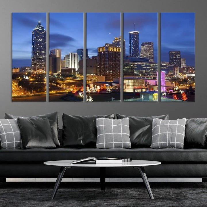 The Atlanta City Canvas Print adorns the wall, showcasing the cityscape of illuminated skyscrapers at dusk on a gallery-wrapped museum-quality canvas.