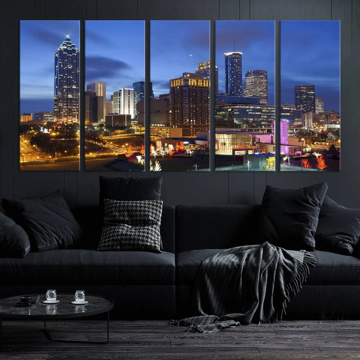 The Atlanta City Canvas Print adorns the wall, showcasing the cityscape of illuminated skyscrapers at dusk on a gallery-wrapped museum-quality canvas.