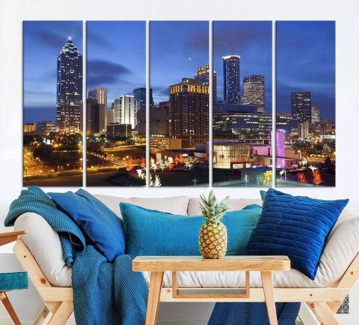 The Atlanta City Canvas Print adorns the wall, showcasing the cityscape of illuminated skyscrapers at dusk on a gallery-wrapped museum-quality canvas.