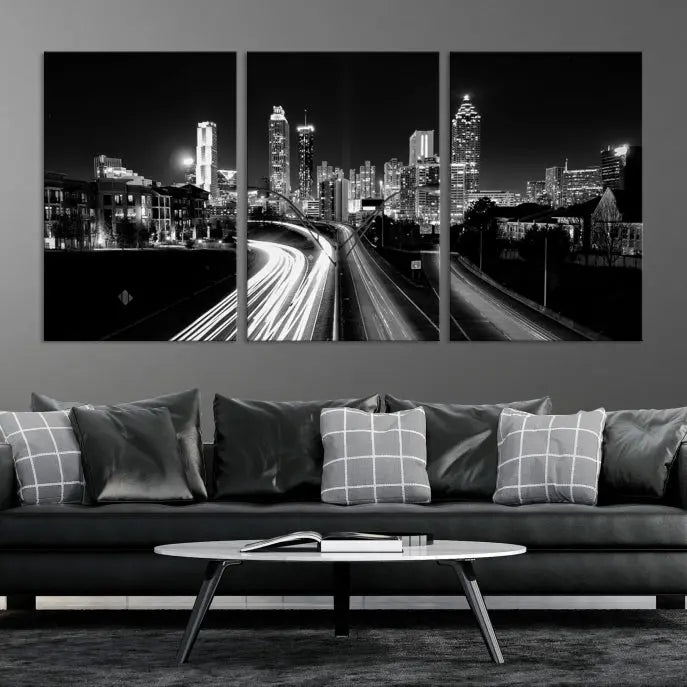 The room features an Atlanta City Lights Black and White Wall Art Cityscape Canvas Print on the wall, with the piece gallery wrapped on museum-quality canvas.