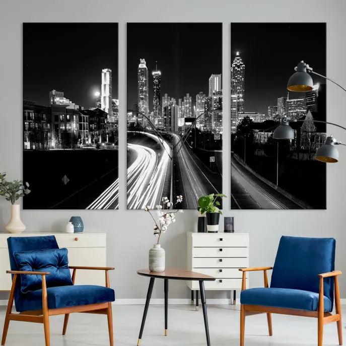 The room features an Atlanta City Lights Black and White Wall Art Cityscape Canvas Print on the wall, with the piece gallery wrapped on museum-quality canvas.