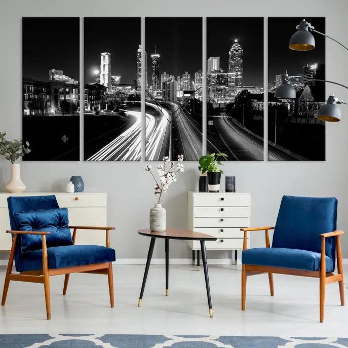 The room features an Atlanta City Lights Black and White Wall Art Cityscape Canvas Print on the wall, with the piece gallery wrapped on museum-quality canvas.