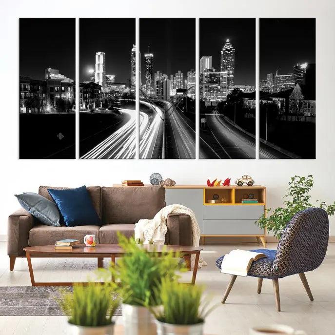 The room features an Atlanta City Lights Black and White Wall Art Cityscape Canvas Print on the wall, with the piece gallery wrapped on museum-quality canvas.