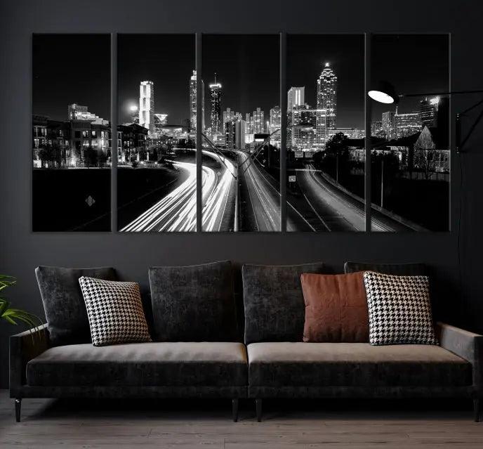 The room features an Atlanta City Lights Black and White Wall Art Cityscape Canvas Print on the wall, with the piece gallery wrapped on museum-quality canvas.