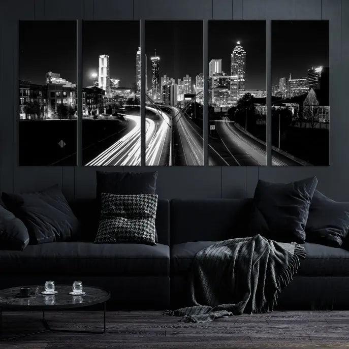 The room features an Atlanta City Lights Black and White Wall Art Cityscape Canvas Print on the wall, with the piece gallery wrapped on museum-quality canvas.