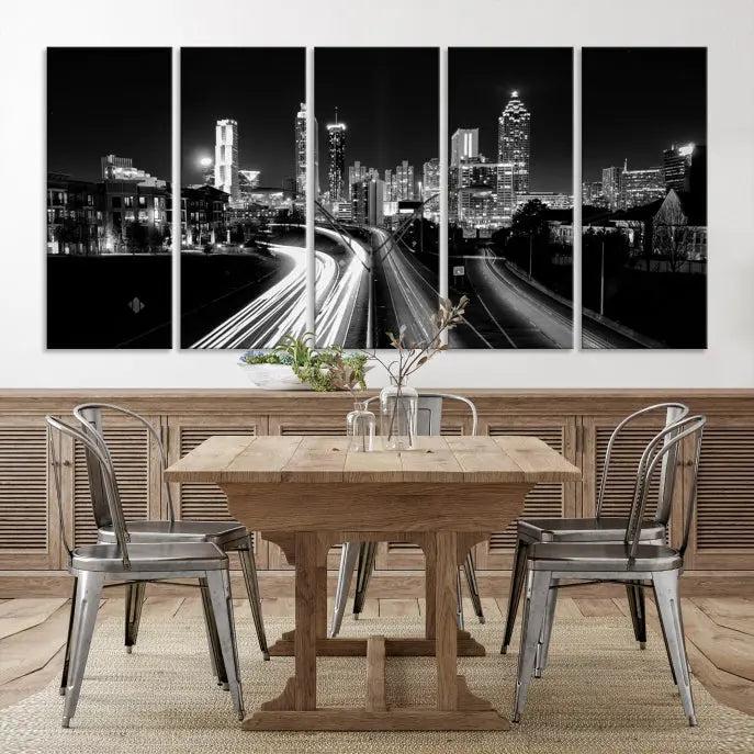 The room features an Atlanta City Lights Black and White Wall Art Cityscape Canvas Print on the wall, with the piece gallery wrapped on museum-quality canvas.