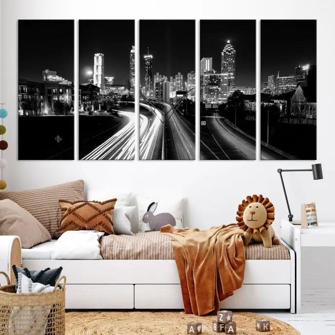 The room features an Atlanta City Lights Black and White Wall Art Cityscape Canvas Print on the wall, with the piece gallery wrapped on museum-quality canvas.