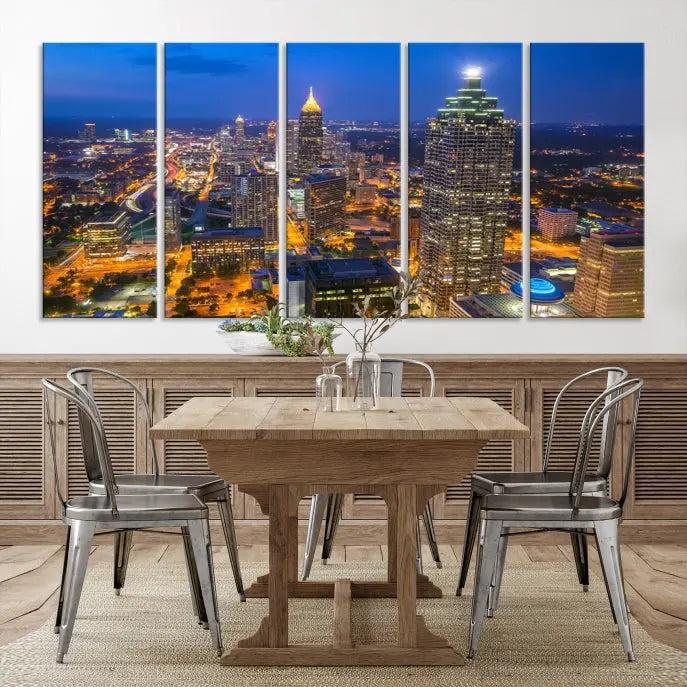 The room features three stunning pieces of the "Atlanta City Lights Cityscape View" wall art canvas prints, showcasing a lit-up city skyline adorned on the wall.