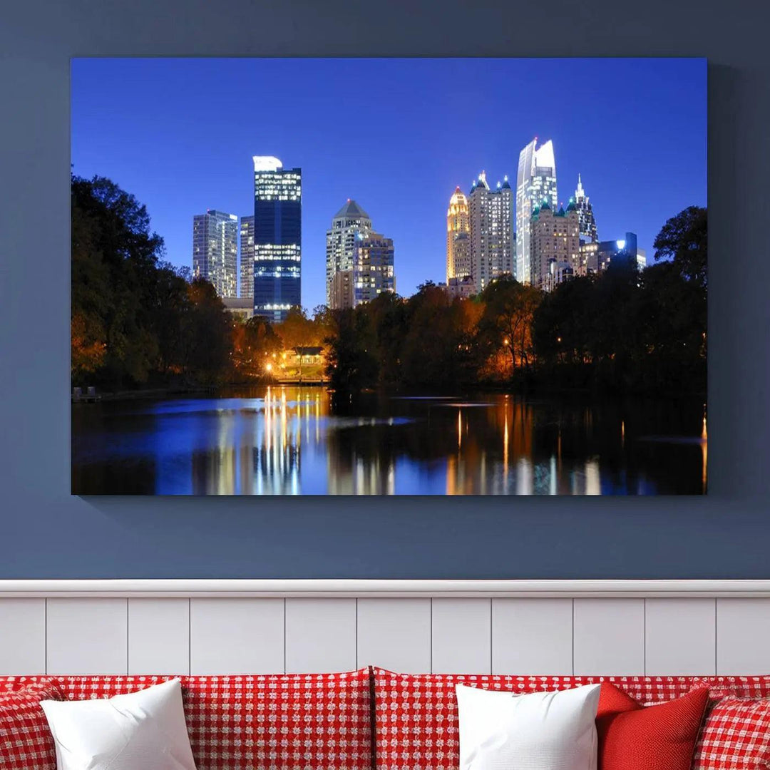 The Atlanta City Lights Night Blue Skyline is a triptych showcasing a night cityscape on museum-quality canvas.